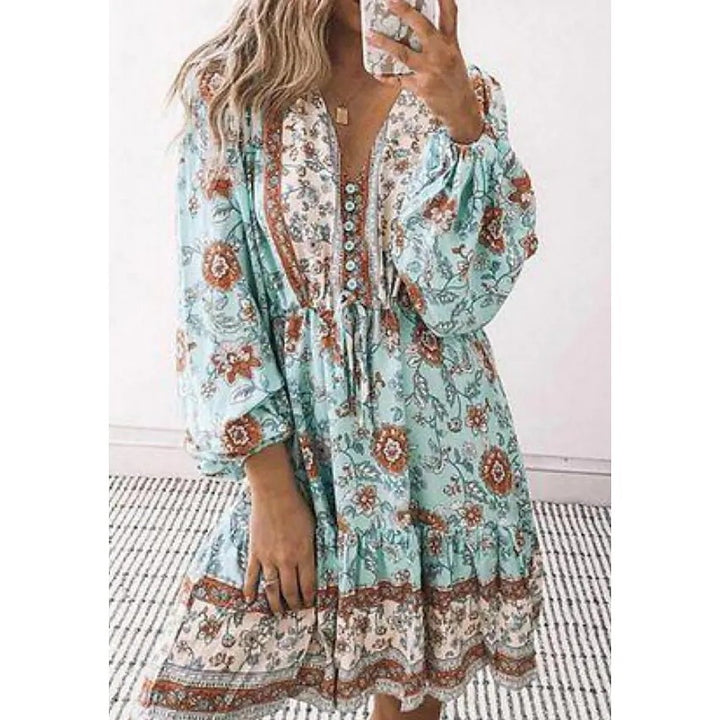 Dame Boho-inspireret fritidskjole med ballonærmer og knapdetalje Stilla