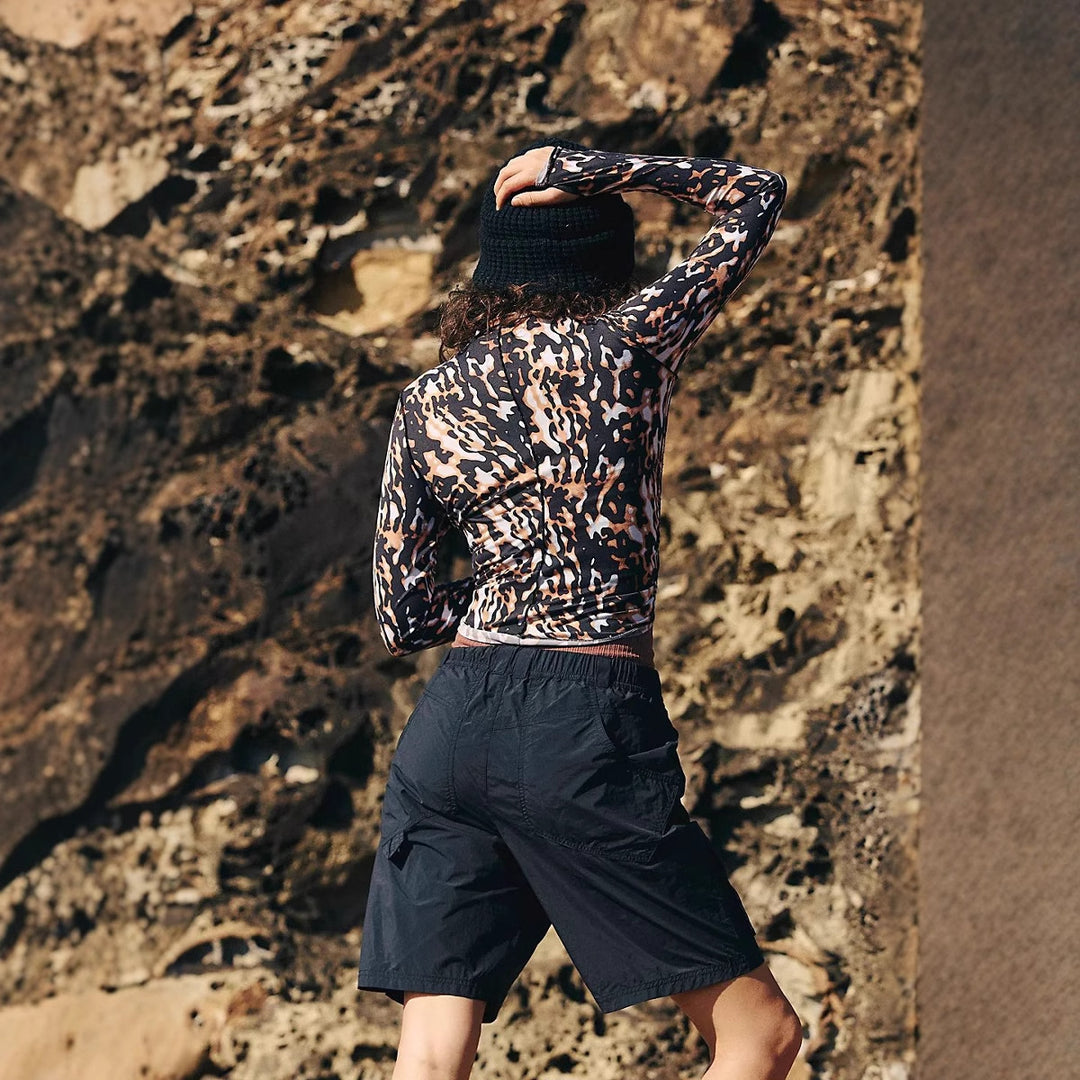 Dame sporty langærmet top i leo-design Stilla