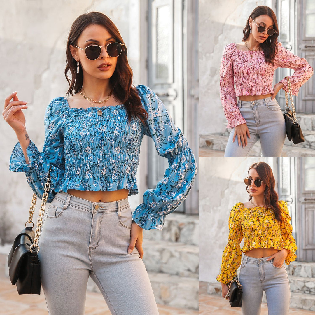 Damebluse med voluminøse ærmer og blomsterprint Stilla