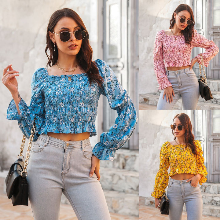 Damebluse med voluminøse ærmer og blomsterprint Stilla