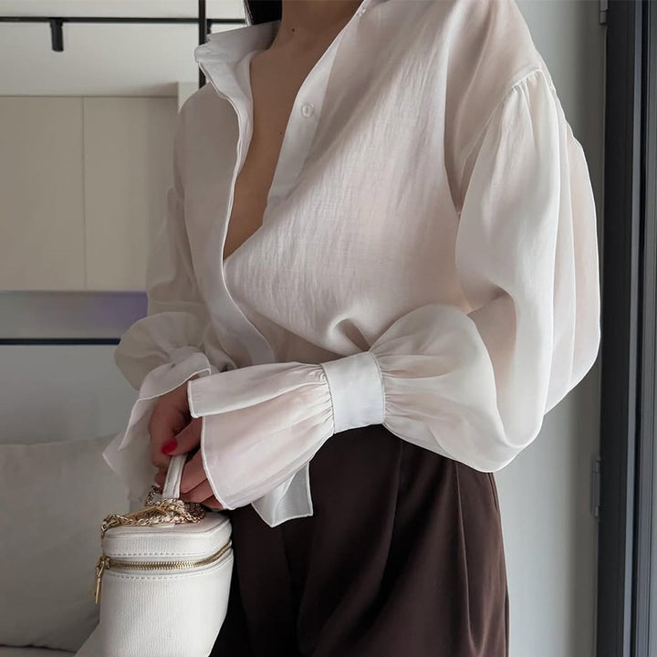 Dame Elegant Bluse med voluminøse Puffærmer og fint Strukturdesign Stilla