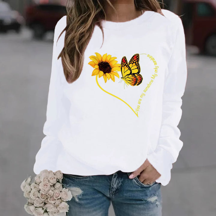 Kvinders sweatshirt med grafisk sommerfugl og solskinsmotiv Stilla