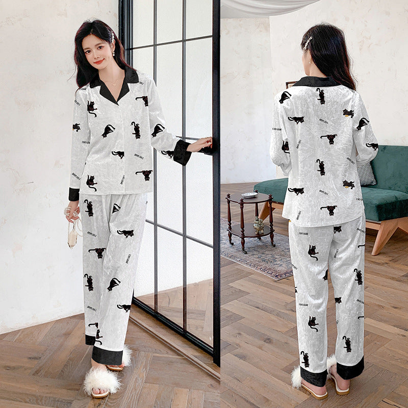 Dame modernt pyjamasæt med tropisk print og komfortdetaljer Stilla