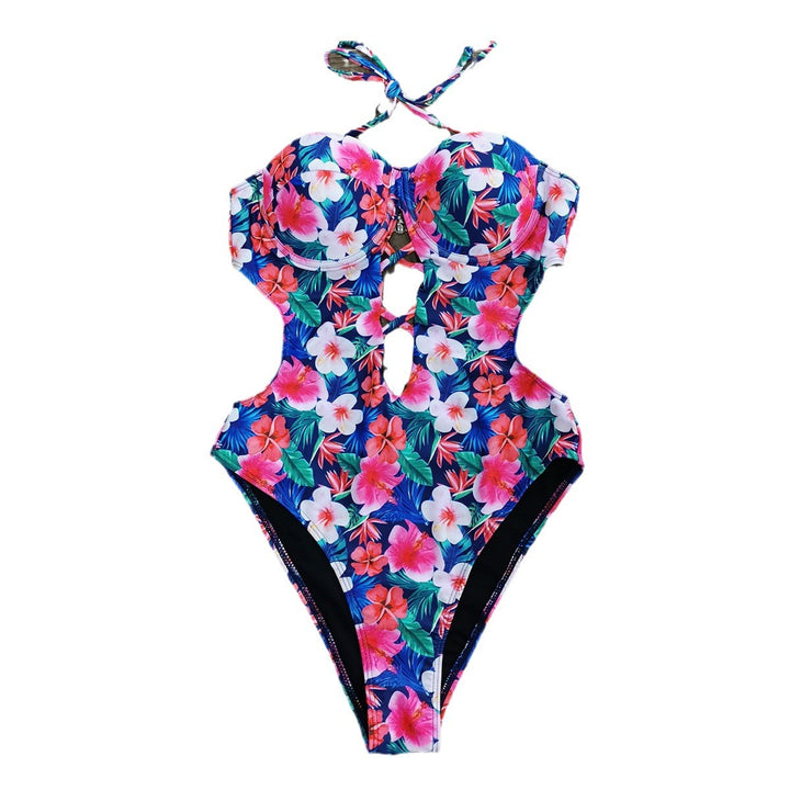 Dame en-delt badesuit med innovativt cut-out og farverigt mønster Stilla