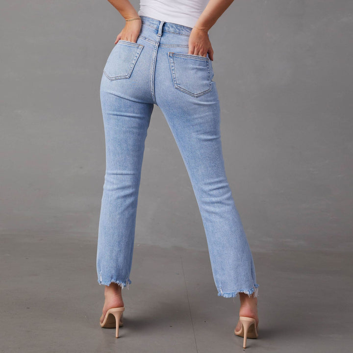 Dame Bootcut Jeans med frynset kanter og modepræget karakter Stilla