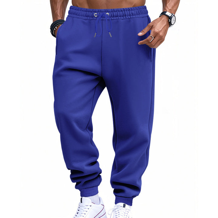 Herre sporty joggingbukser med elastisk talje og sidelommer med lynlås Stilla