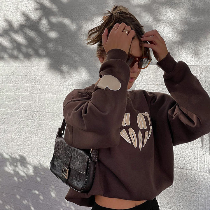 Dame Sweatshirt med moderne skrift og afslappet snit Stilla