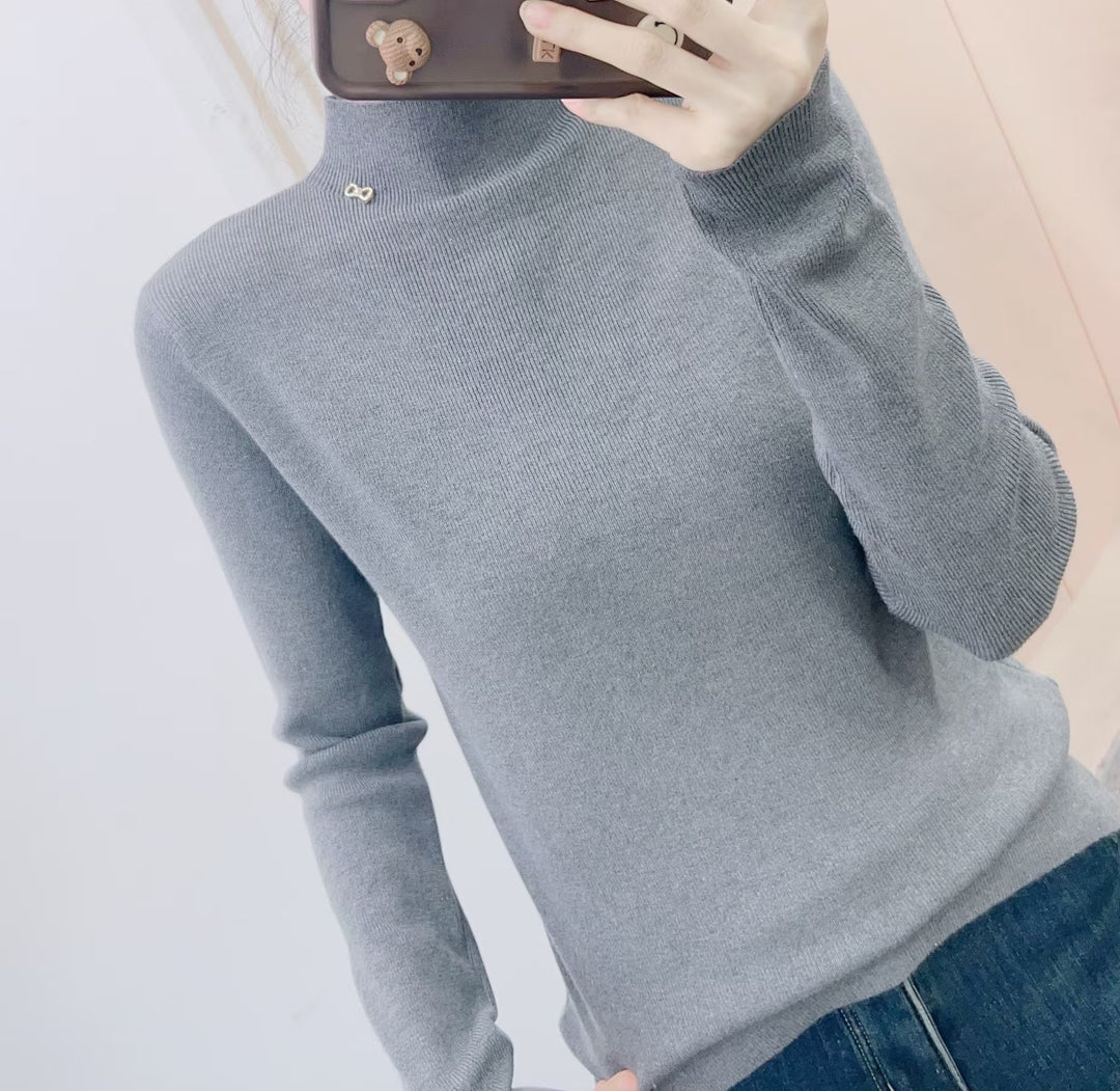 Dame fin rullekrave sweater med dekorerende accenter Stilla