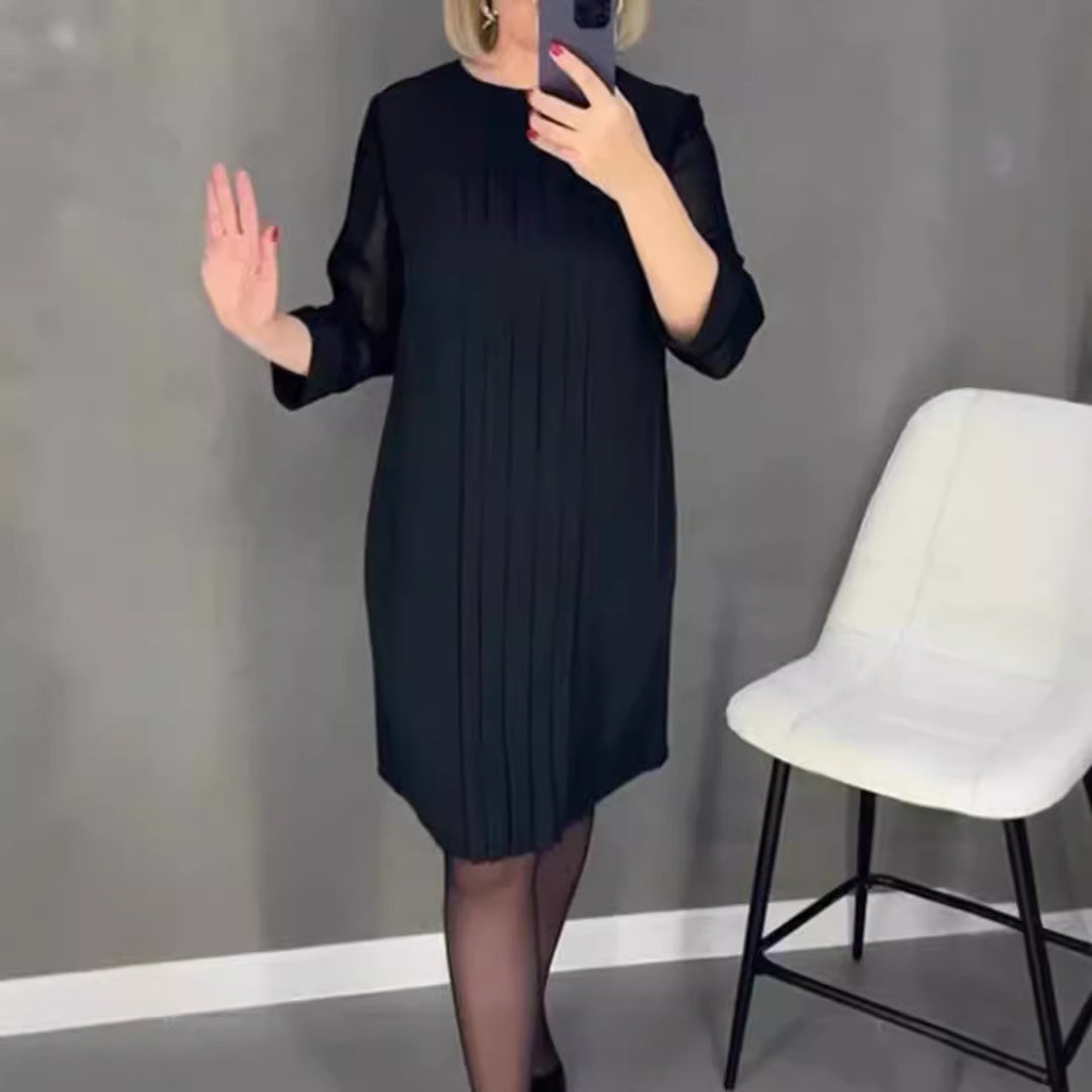 Dame Plisse aften kjole med gennemsigtige ærmer og elegant snit Stilla