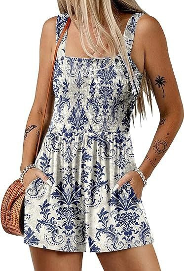 Dame jumpsuit med blomster mønster og praktiske lommer Stilla