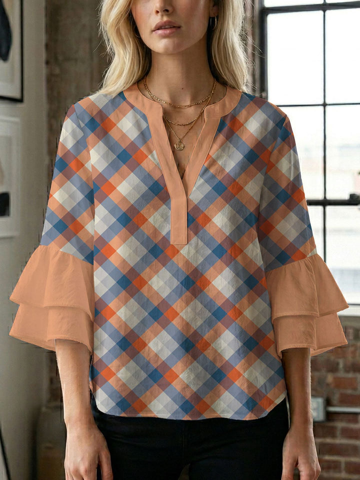 Dame bluse med voluminøse ærmer og kreativt trykdesign Skovae