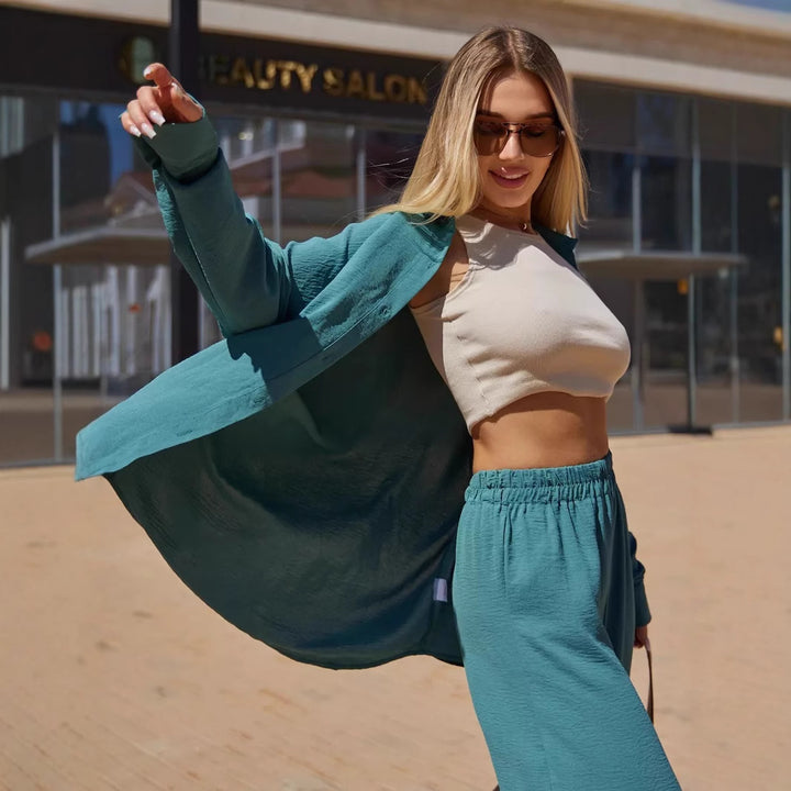 Dame Oversize Bluse med off-shoulder design og flydende snit Stilla