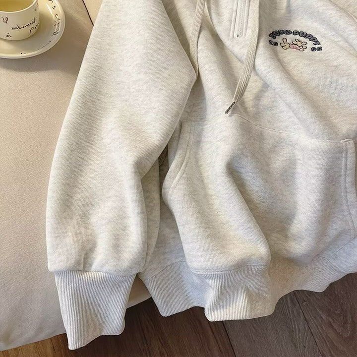 Dame hyggelig hættepullover med halv høj lynlås og kreativt motiv Stilla
