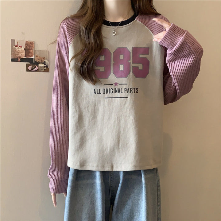 Femme Relaxed Fit Grafik Sweatshirt med kontrast ribærmer Stilla