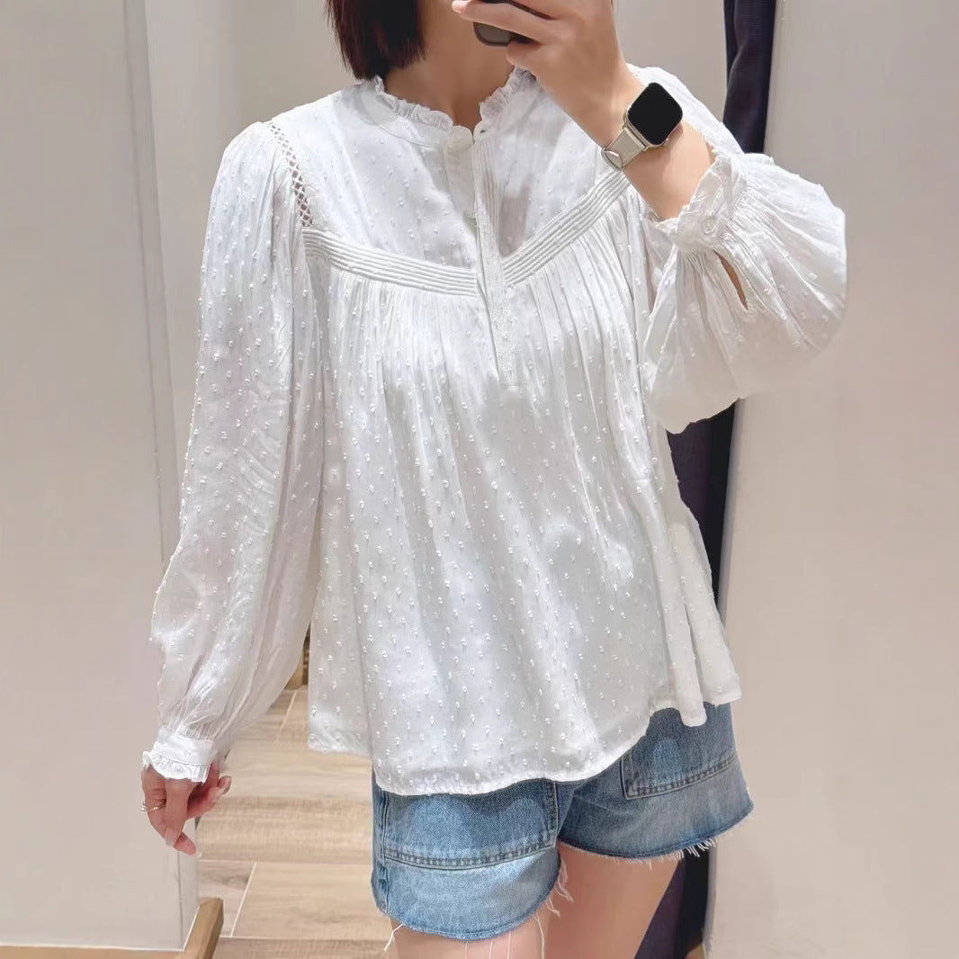 Damebluse med elegant krave og raffinerede pufærmer Stilla