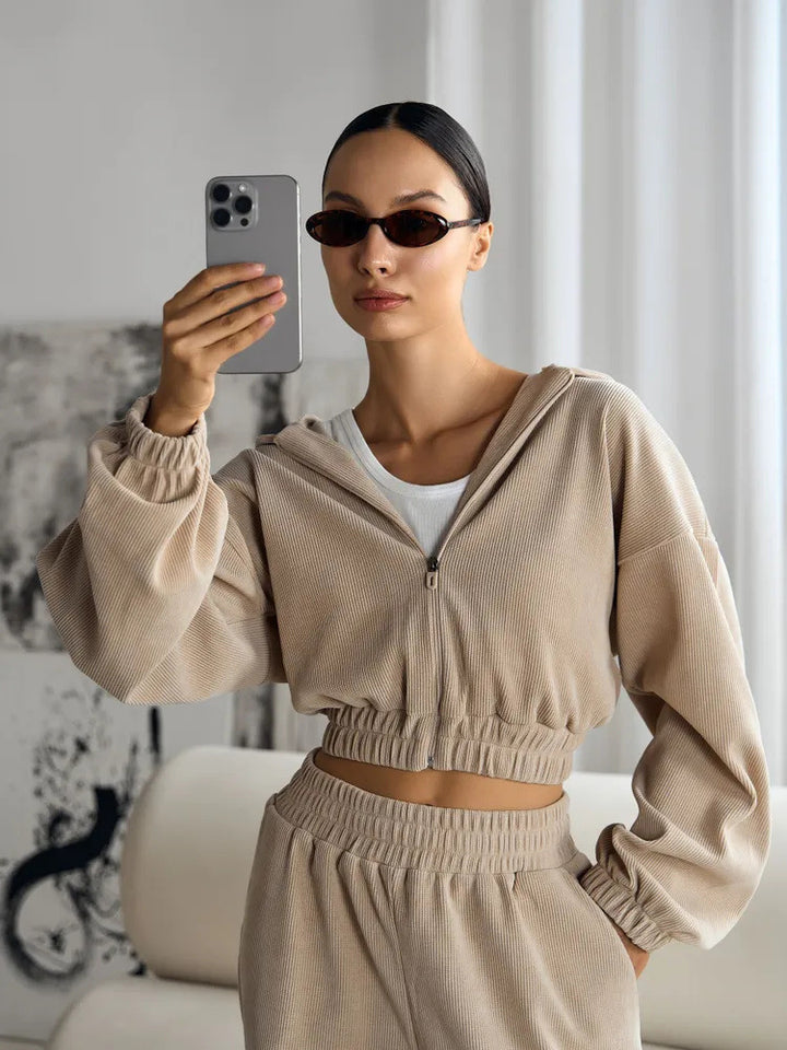 Kvinders cropped sweatshirt med lynlås og elastisk talje