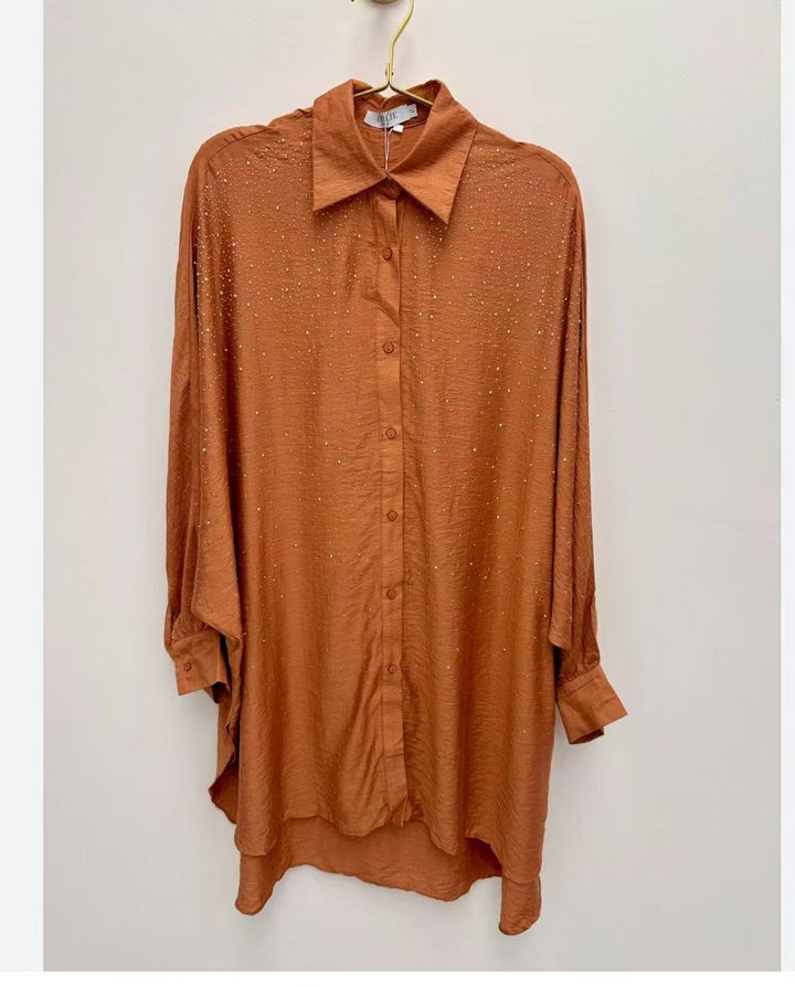 Damebluse med glitrende detaljer og afslappet pasform Stilla