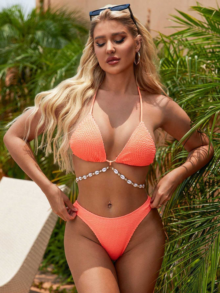 Dame triangel-bikini med elegant struktur og modige perledetaljer Stilla