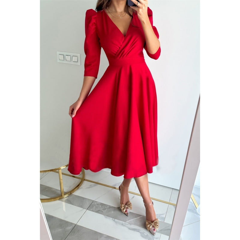 Femme Elegantes Fit-and-Flare Midi Kjole med Pufærmer Stilla