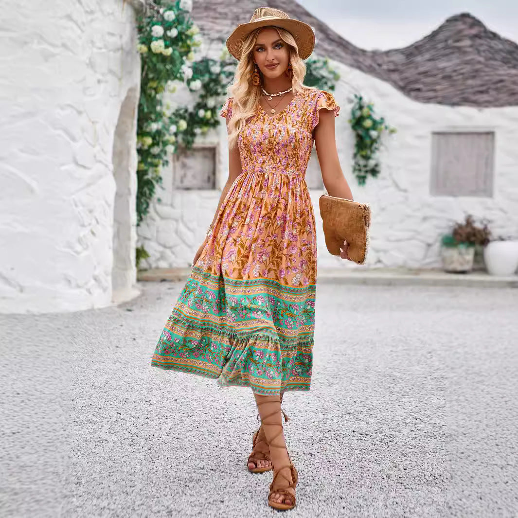 Dame midikjole i bohemian stil med patchwork-mønster og flydende skørt Stilla