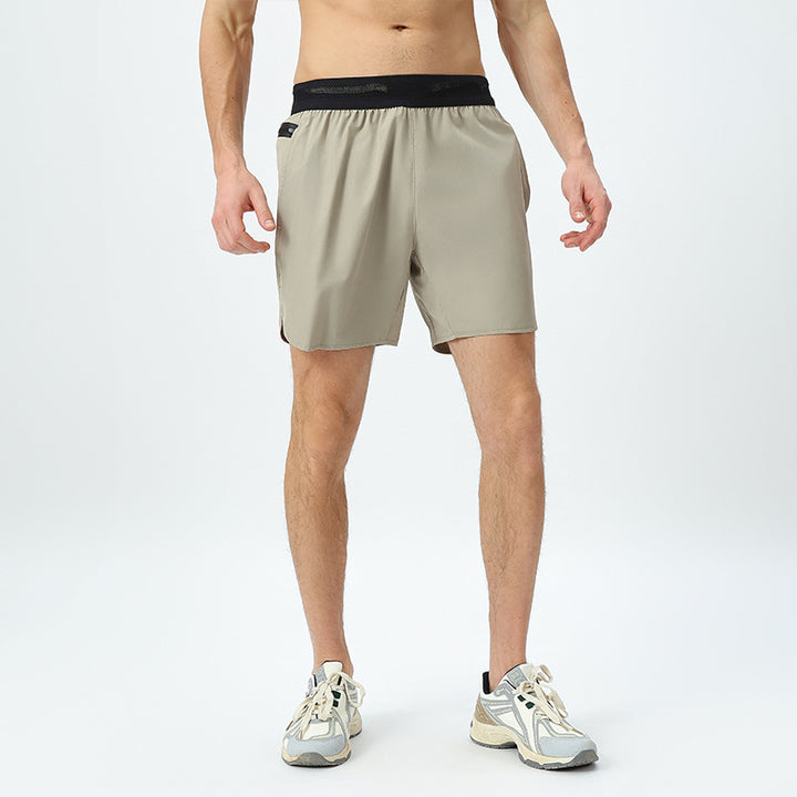 Herre åndbare sportshorts med elastisk linning og hurtigttørrende materiale Stilla