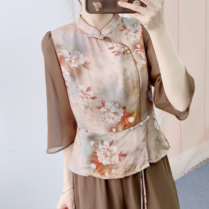 Dame Elegant og luftig bluse med florale accenter og bred skæring Stilla