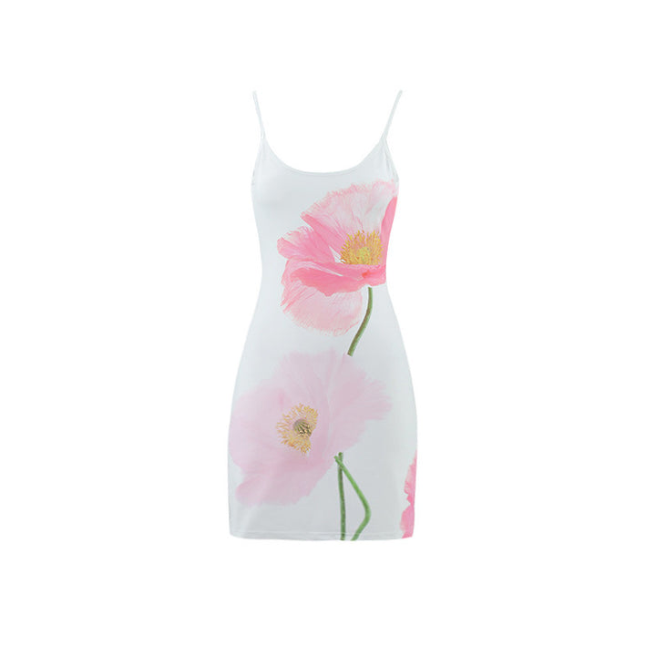 Dame sommerkjole med stilfuldt blomsterprint og elegante spaghetti-stropper Skovae