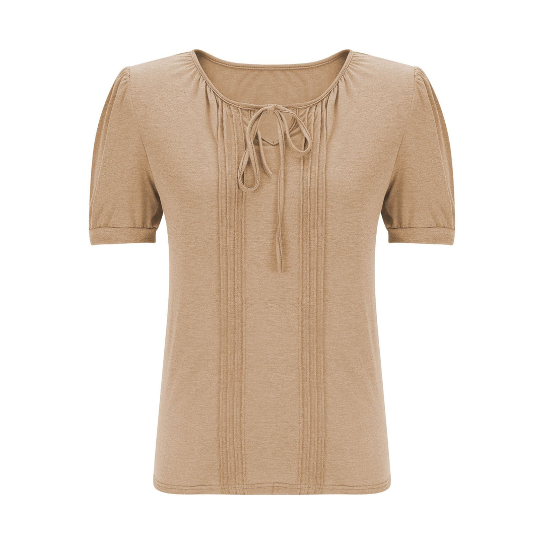 Damebluse med puffærmer og raffineret halterneck Stilla