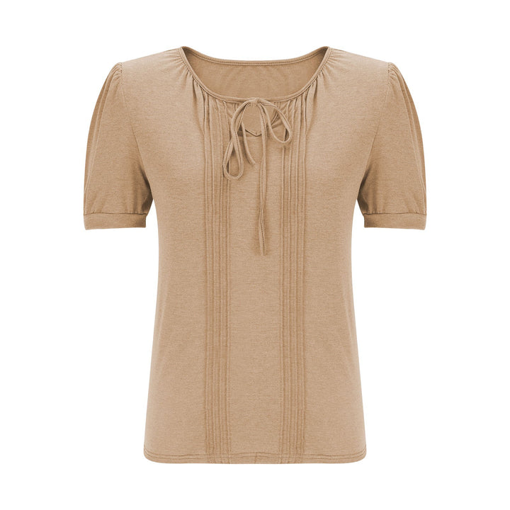 Damebluse med puffærmer og raffineret halterneck Stilla