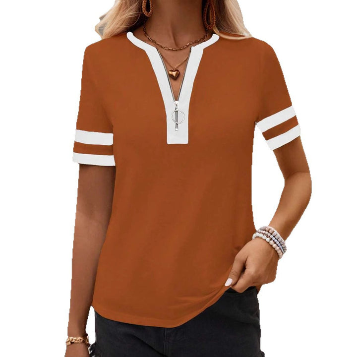 Dame Poloshirt med lynlås og sporty ærmedetaljer Stilla