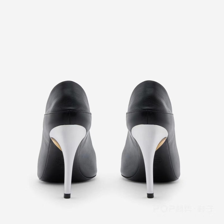 Femme Open-Toe High-Heeled Mules med skulpturel metalaccent Stilla