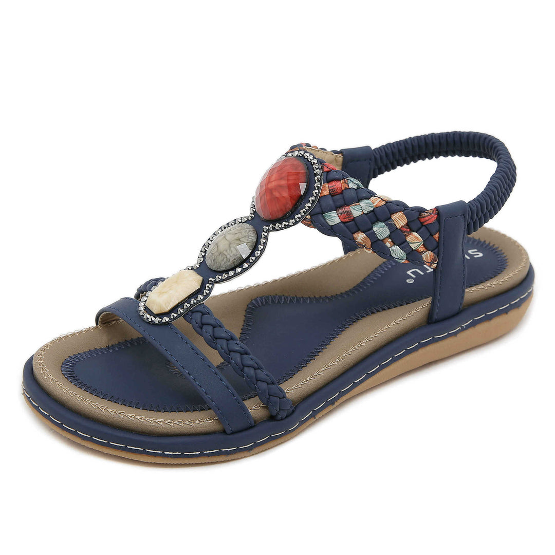 Dame sandaler med flettet remdesign og elegante smykkesten Stilla