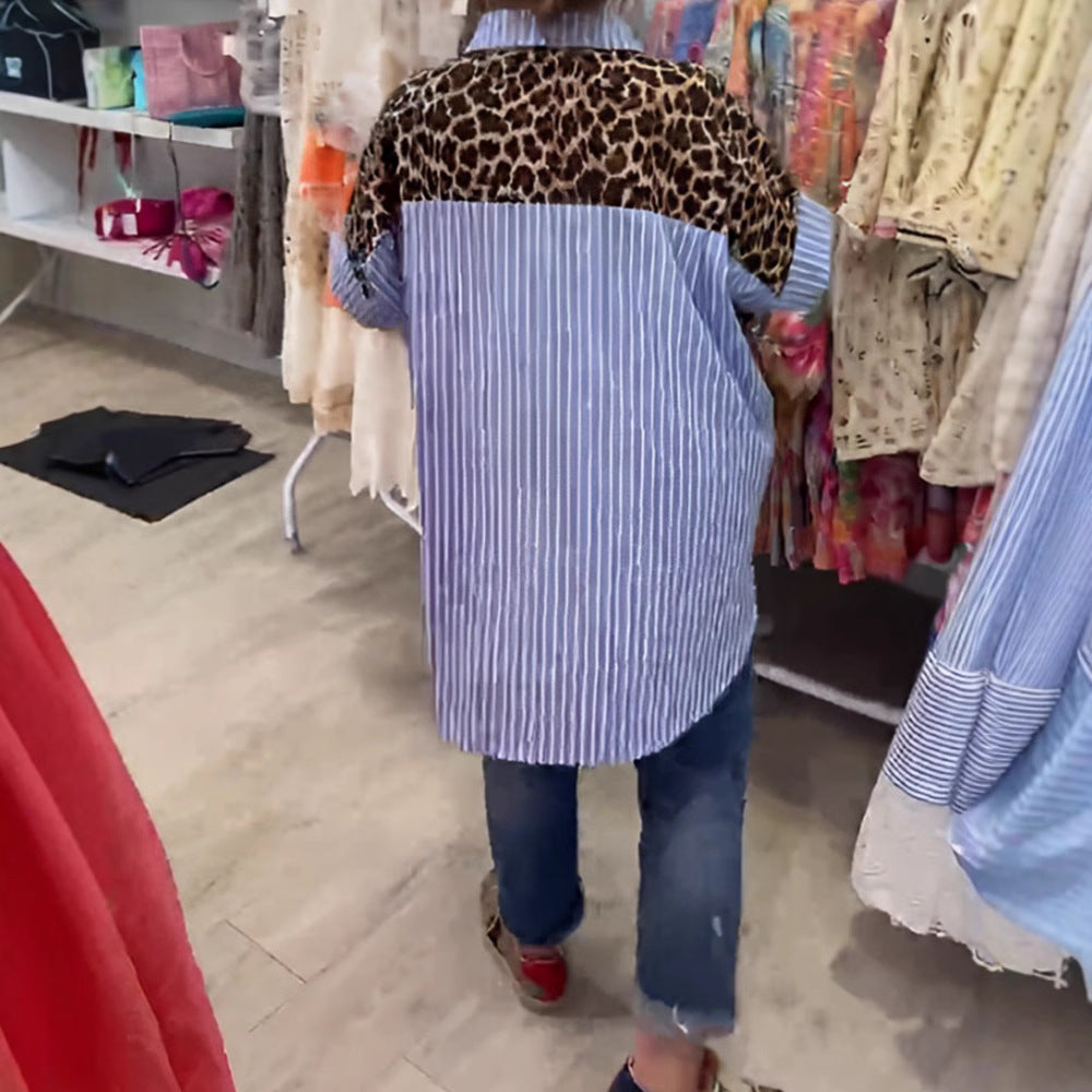 Dame med vidt skårne poncho-tunika med leopardprint og dekorative flamingo-applikationer Skovae。