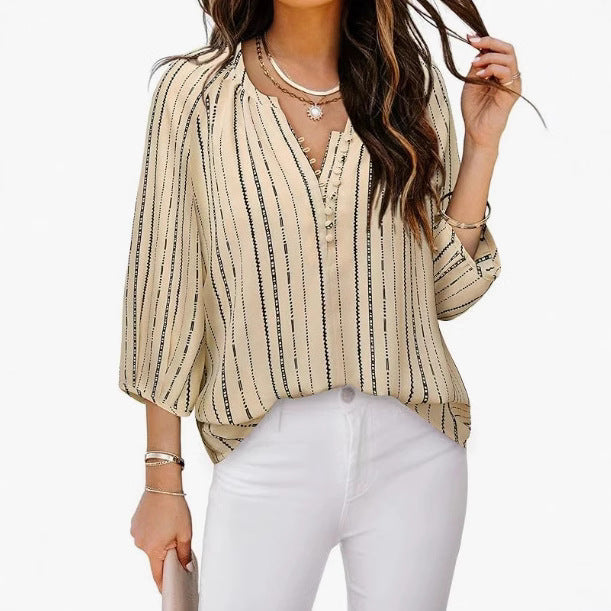 Damebluse med stribet design og elegante knapdetaljer Stilla
