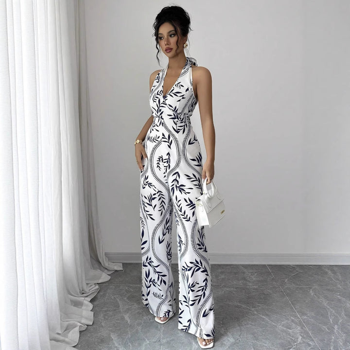 Dame jumpsuit med blomsterprint og smart V-hals Stilla