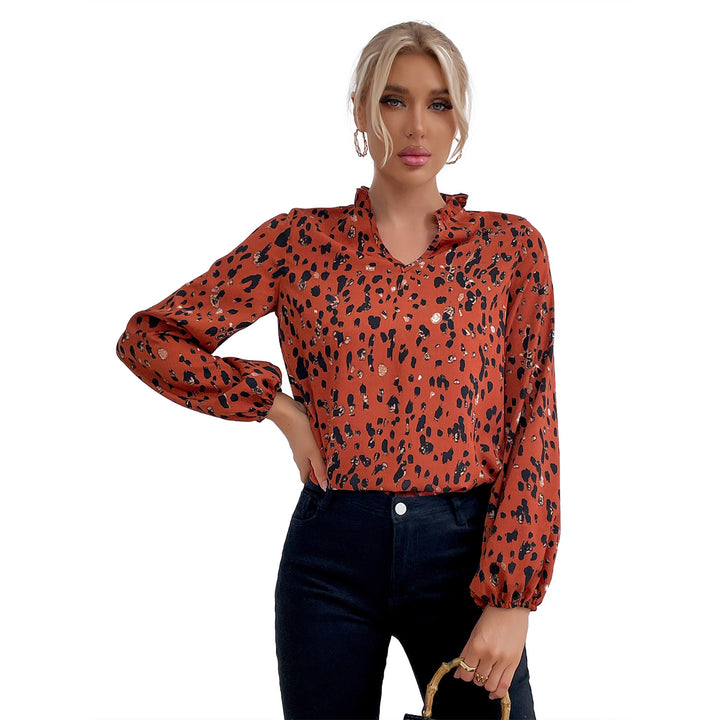 Kvinders bluse med blomsterlig leopardmønster og voluminøse ærmer Stilla