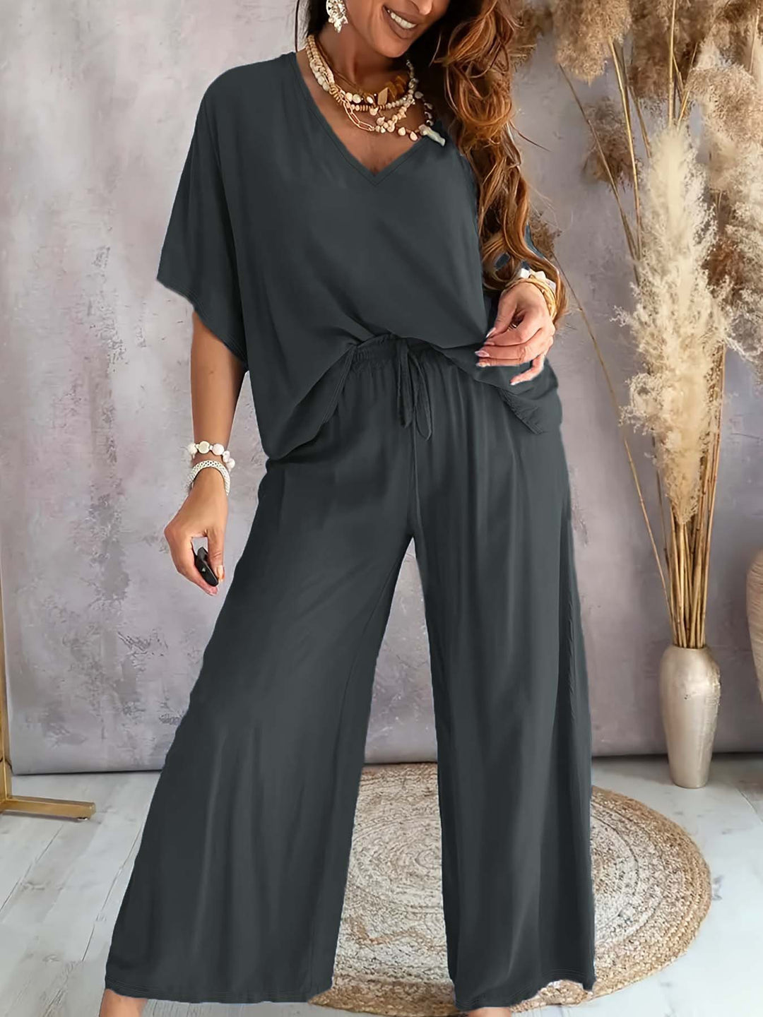 Dame Komfortabel Jumpsuit med V-udskæring og elastisk talje Stilla