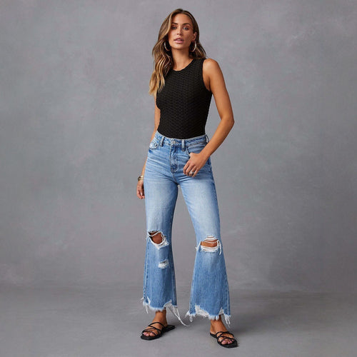 Dame flared jeans med stilfulde rifte detaljer og frynset kant Skovae