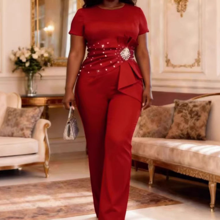 Dame elegant jumpsuit med figursyet silhuet og flæsedetaljer Skovae
