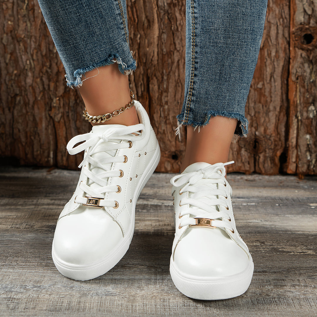 Dame Sportliche Fritids-sneakers med fashionable metalakcenter Stilla