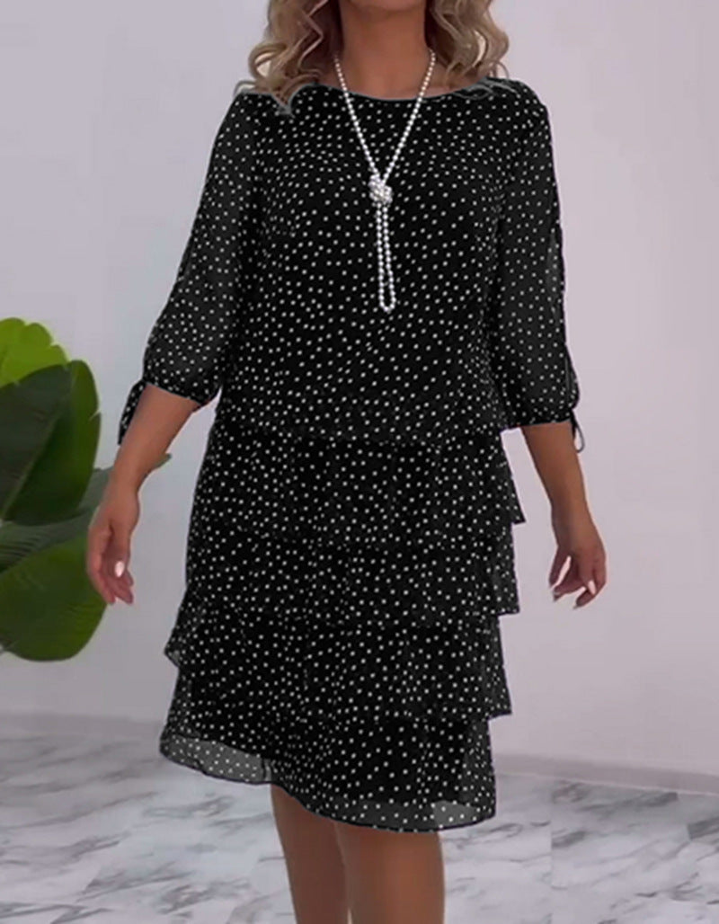 Dame ærmeløs pencilkjole med elegant flæse og feminine prikker Stilla