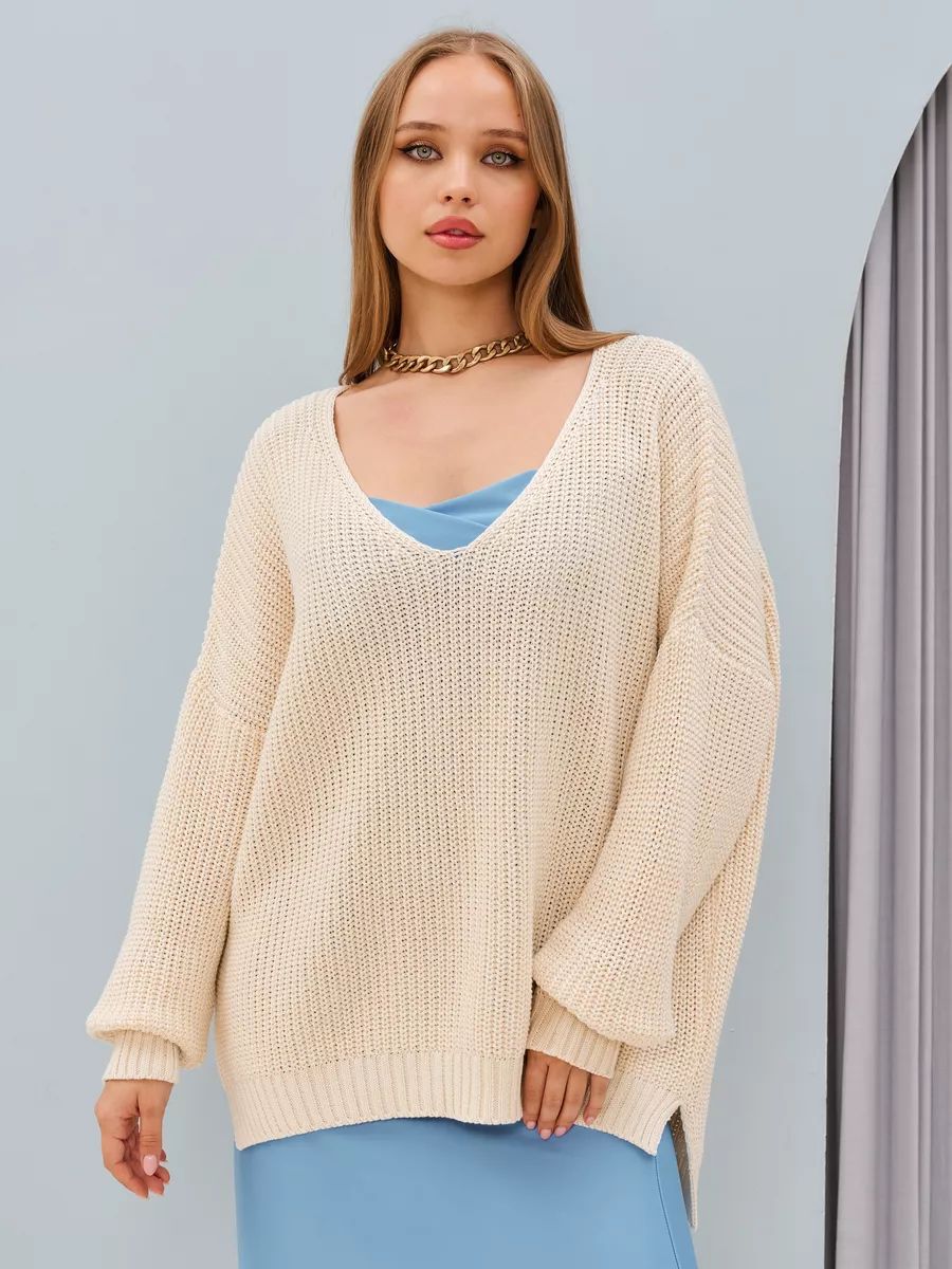 Dame Oversized Strikbluse med asymmetrisk udskæring og brede ribstrikdetaljer Stilla