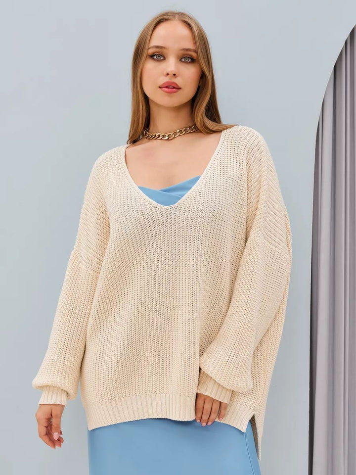 Dame Oversized Strikbluse med asymmetrisk udskæring og brede ribstrikdetaljer Stilla