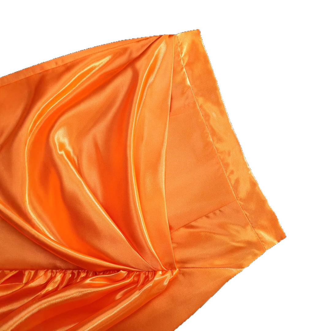 Dame Elegant satin skirt with asymmetric design and voluminous ruffle finish Skovae