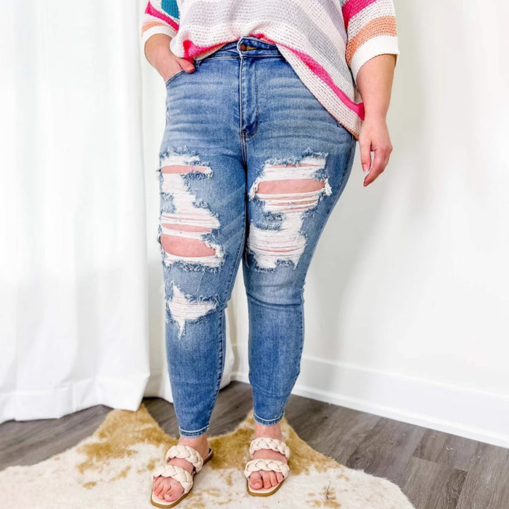 Dame skinny jeans med trendy slidt udseende og elastisk talje Skovae
