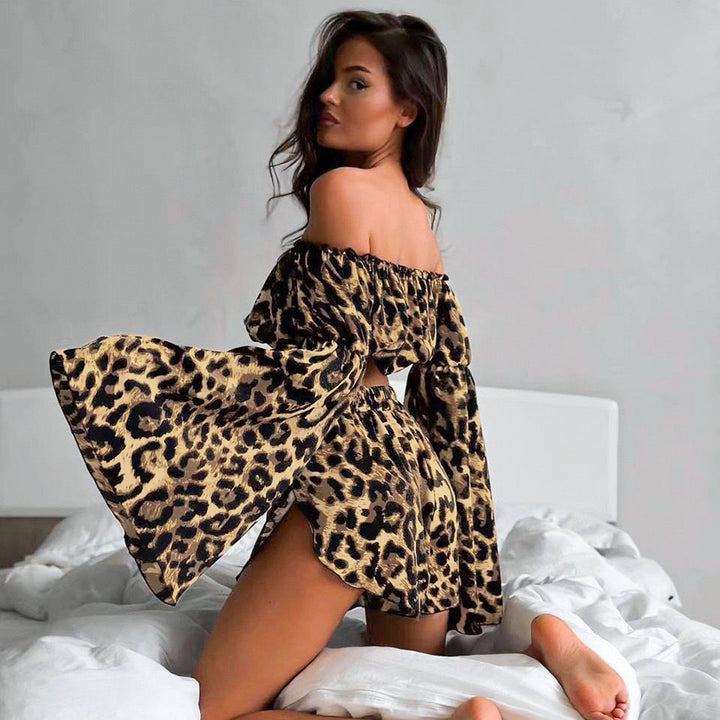 Dame Off-Shoulder Crop-Top med voluminøse ærmer og animalisk mønster Stilla