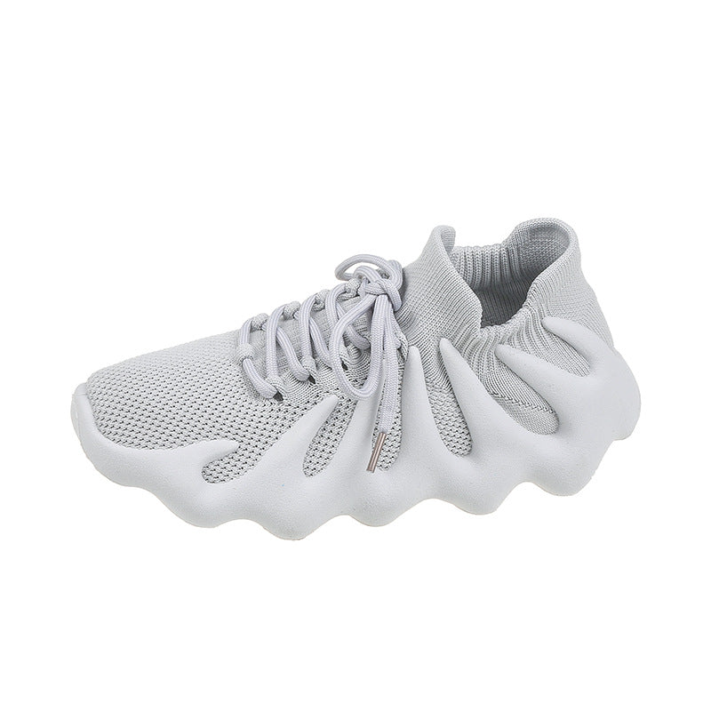 Dame Sneakers i futuristisk design med fleksibelt strik-overmateriale og innovative dæmpningsegenskaber Stilla