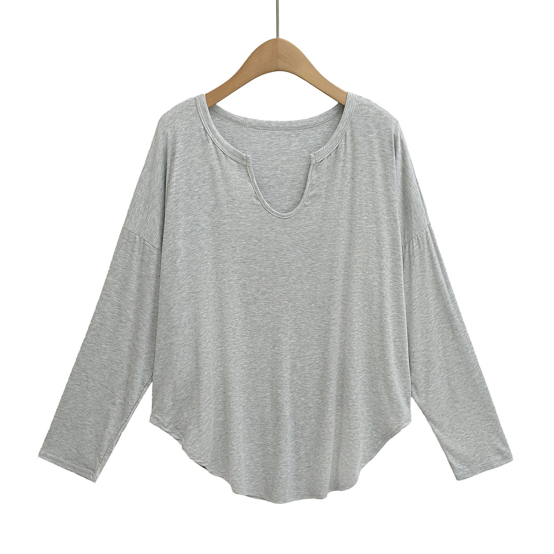Dame afslappet longsleeve top med dyb v-hals og løstsiddende snit Stilla