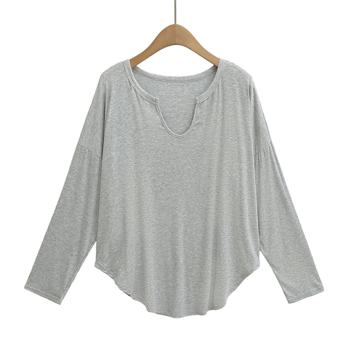 Dame afslappet longsleeve top med dyb v-hals og løstsiddende snit Stilla