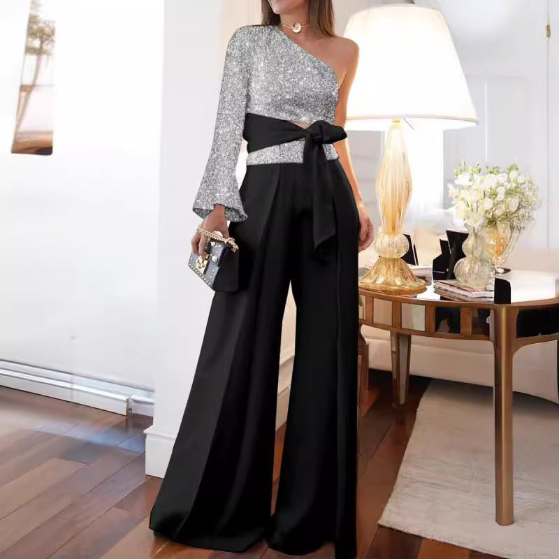 Dame festligt outfit med glitrende overdel og bred bukse Stilla